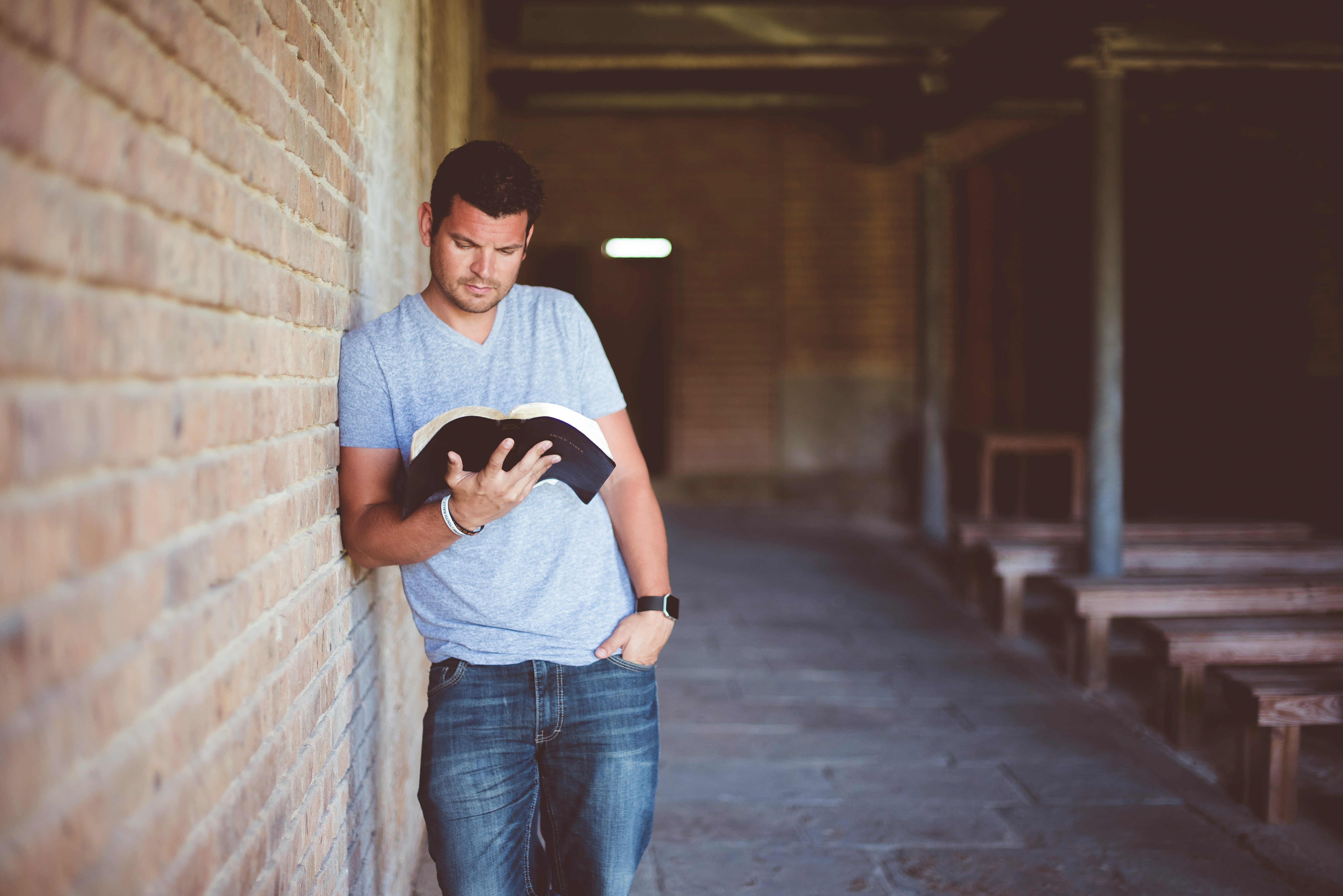 man reading book